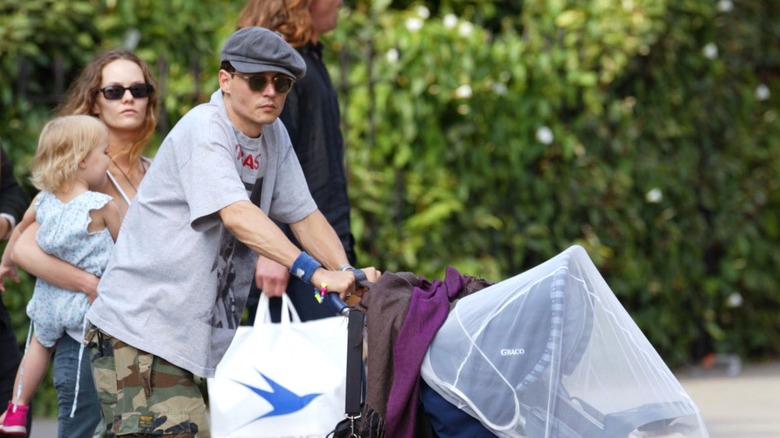 Johnny Deep pushing stroller 