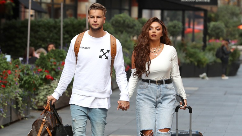 Chris Hughes and Jesy Nelson walking together in 2019