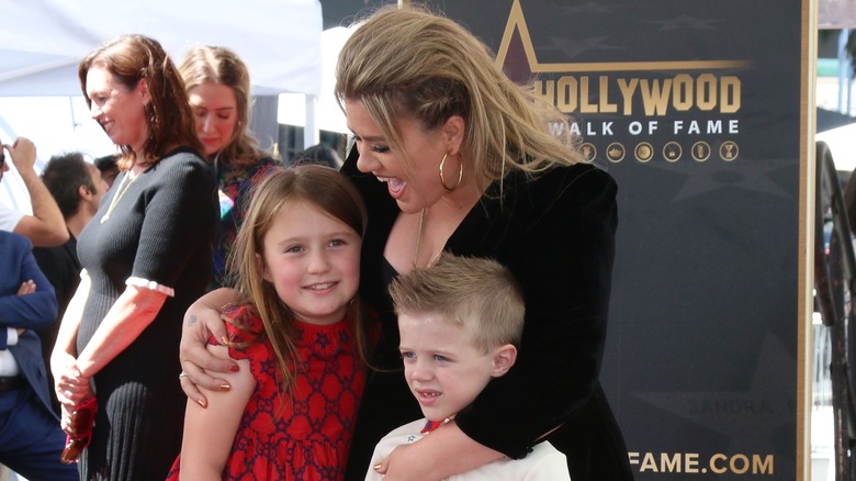 Kelly Clarkson receiving her Hollywood Walk of Fame with her kids, River and Remy