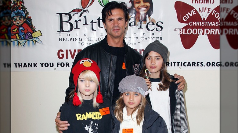 Lorenzo Lamas with daughters Victoria, Isabella, and Alexandra at an event in 2010
