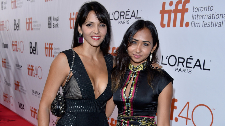 Luciana Barroso Damon and Alexia Barroso posing on a red carpet