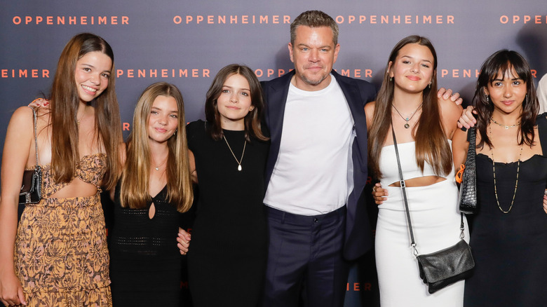 Matt Damon posing with his family