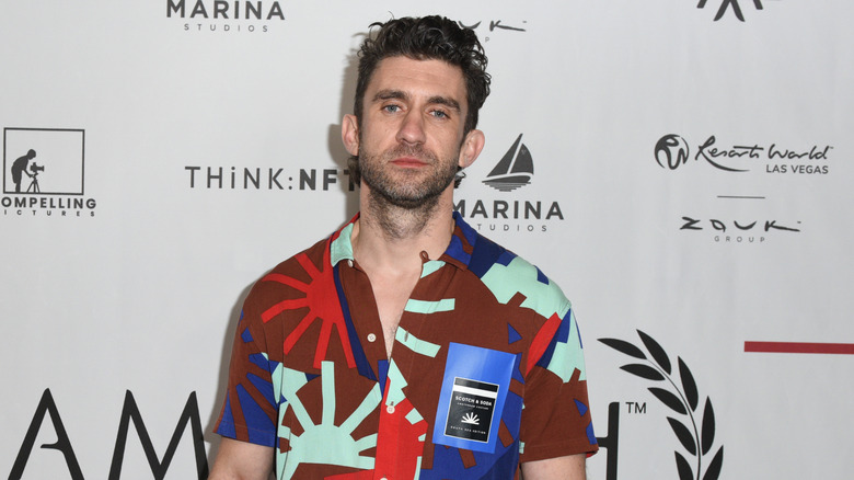 Louie Gibson posing on step-and-repeat