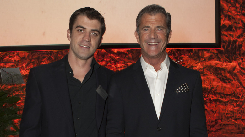 Will and Mel Gibson smiling at an event
