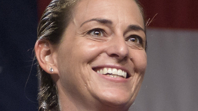 NASA astronaut Nicole Aunapu Mann smiling