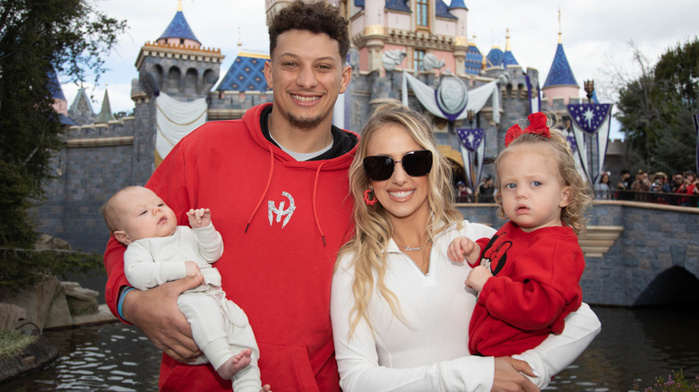 Patrick Mahomes and family posing for photos