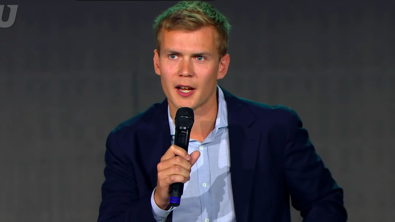 George farmer holding microphone