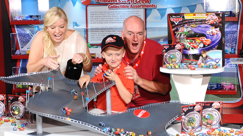 (l-r): Melissa Peterman, her son, Riley Brady, and her husband, John Brady, at an event