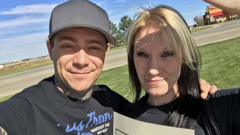 Brian and Courtney Bonsall posing for a photo.