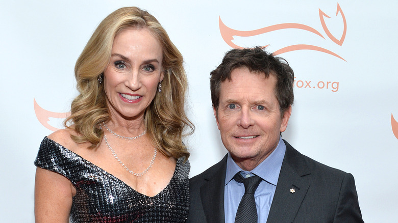 Tracy Pollan and Michael J. Fox walking the red carpet.