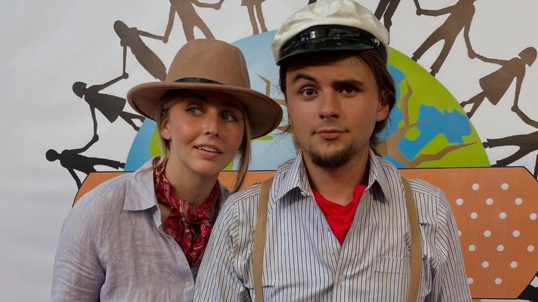 Molly Schirmang and Prince Jackson posing for a photograph