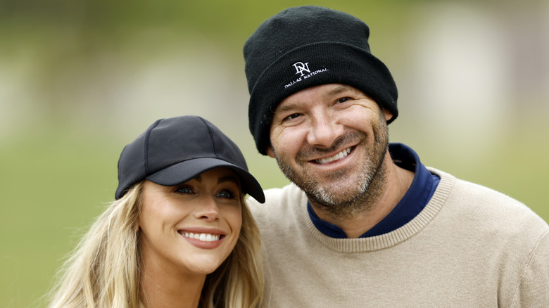 Tony Romo poses with his wife, Candice Crawford