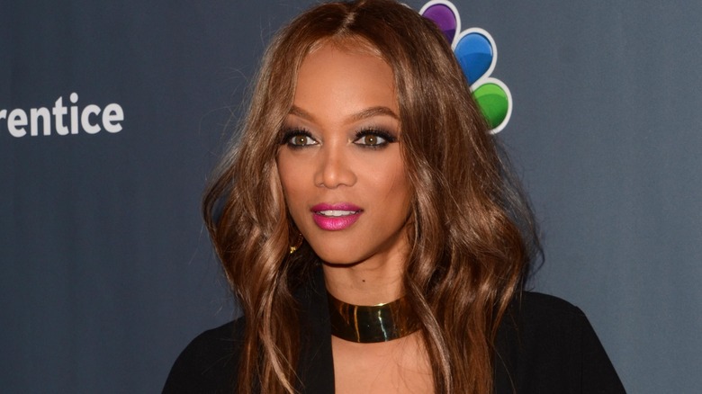 Tyra Banks posing