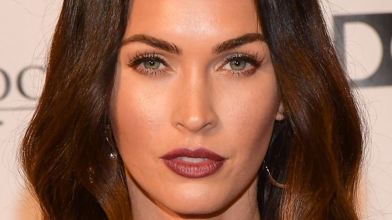 Megan Fox poses on the red carpet