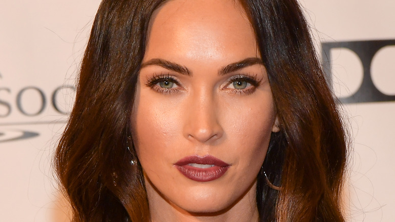 Megan Fox posing at red carpet event