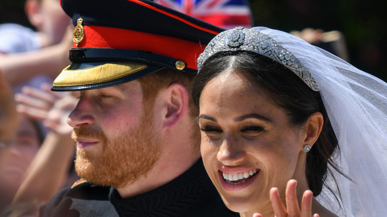 Harry and Meghan smiling 