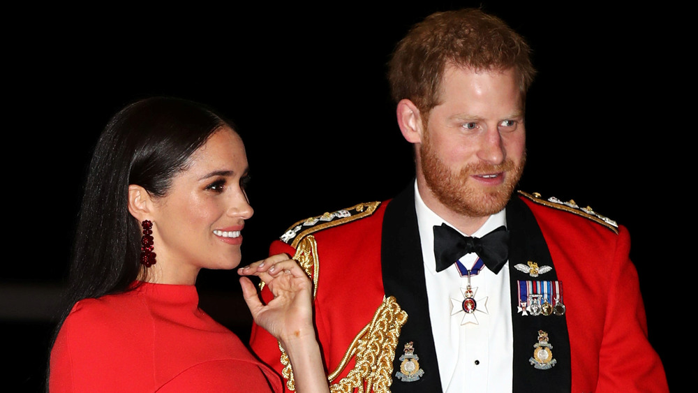 Meghan and Harry in uniform