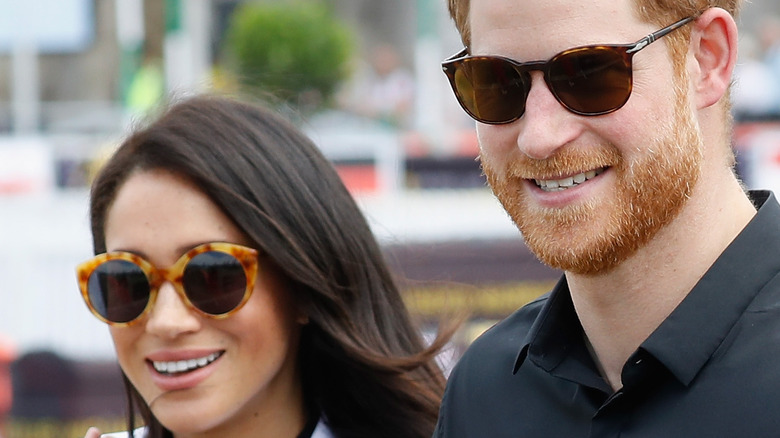 Meghan Markle and Prince Harry at the Invictus Games in sunglasses