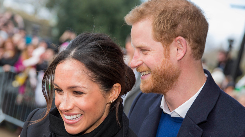 Prince Harry and Meghan Markle laughing