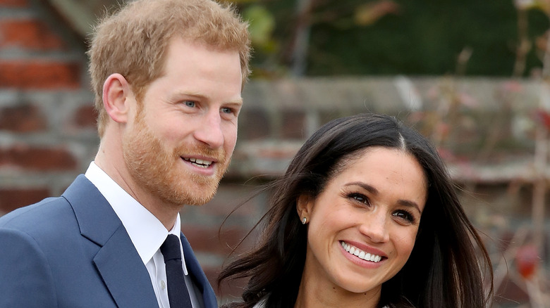 Meghan Markle and Prince Harry posing