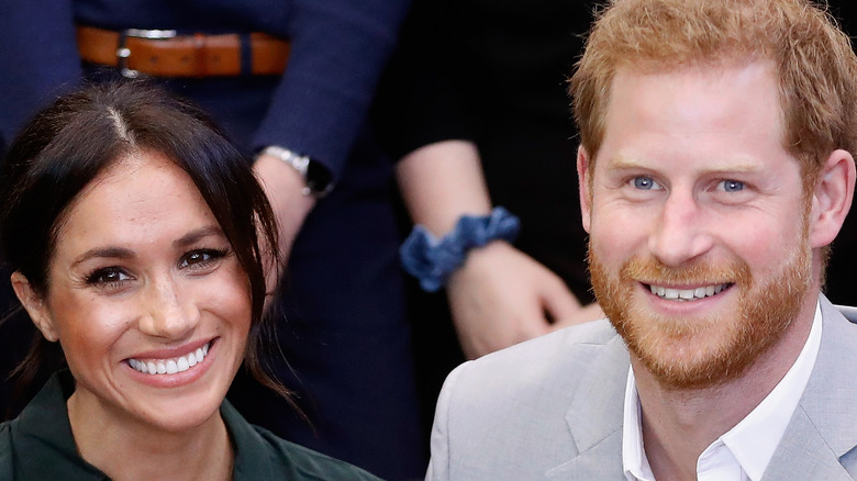 Prince Harry and Meghan Markle smiling 