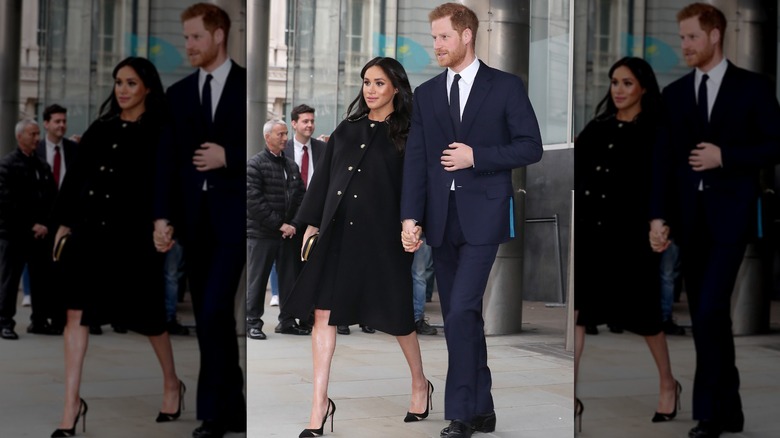 Prince Harry walking with pregnant Meghan Markle 2019