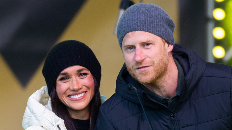 Harry and Meghan in beanies Vancouver 2025