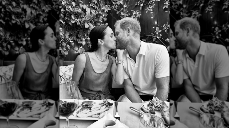 Meghan Markle and Prince Harry sharing a kiss