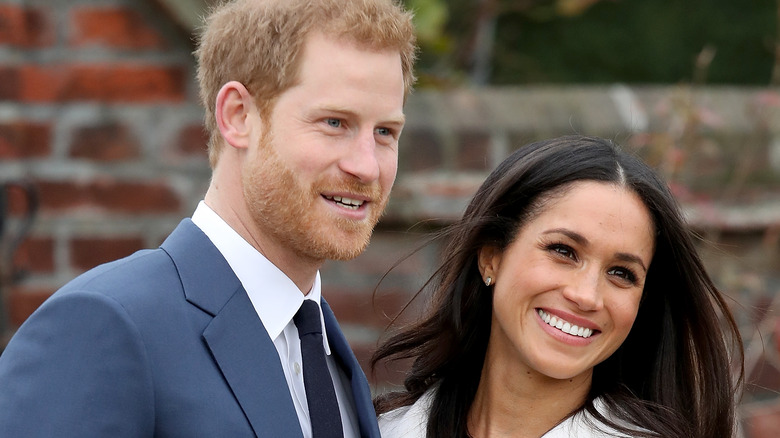 Meghan Markle and Prince Harry smiling