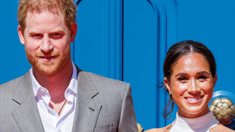 Prince Harry and Meghan Markle smiling