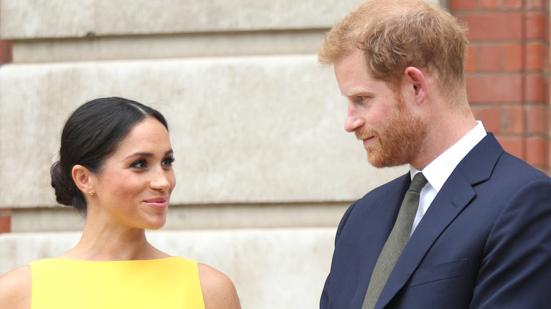Prince Harry & Meghan Markle looking at each other