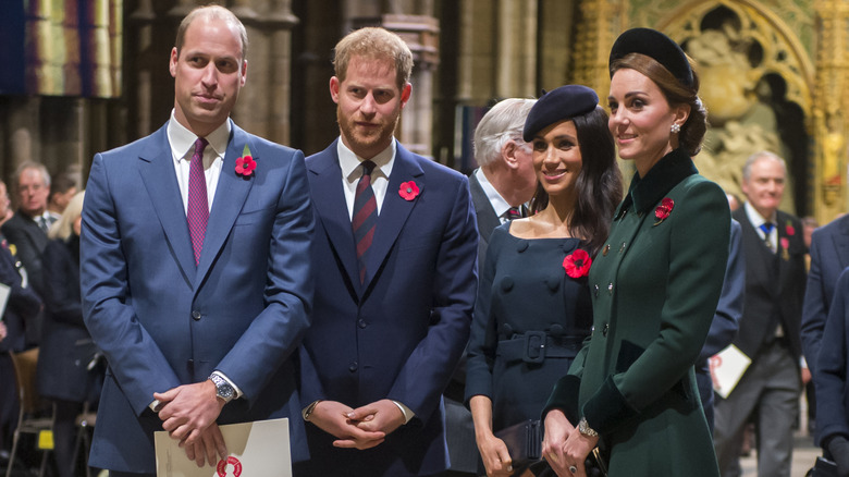 Prince William, Duke of Cambridge and Catherine, Duchess of Cambridge, Prince Harry, Duke of Sussex and Meghan, Duchess of Sussex attend a service marking the centenary of WW1 armistice at Westminster Abbey on November 11, 2018 in London,