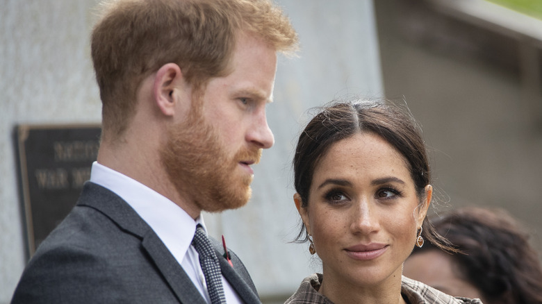 Prince Harry & Meghan Markle smiling 