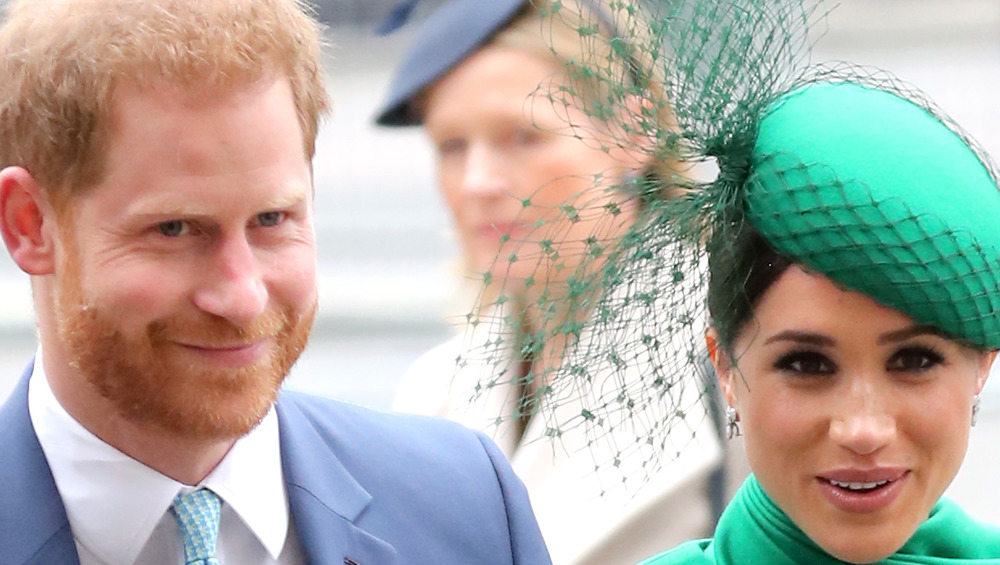 Prince Harry and Meghan Markle smiling