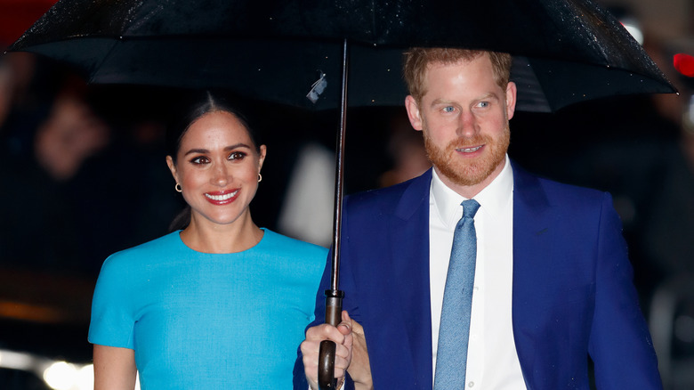 Meghan Markle, Duchess of Sussex, and Prince Harry, Duke of Sussex, smiling