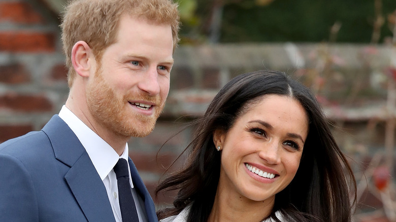 Meghan Markle and Prince Harry smiling