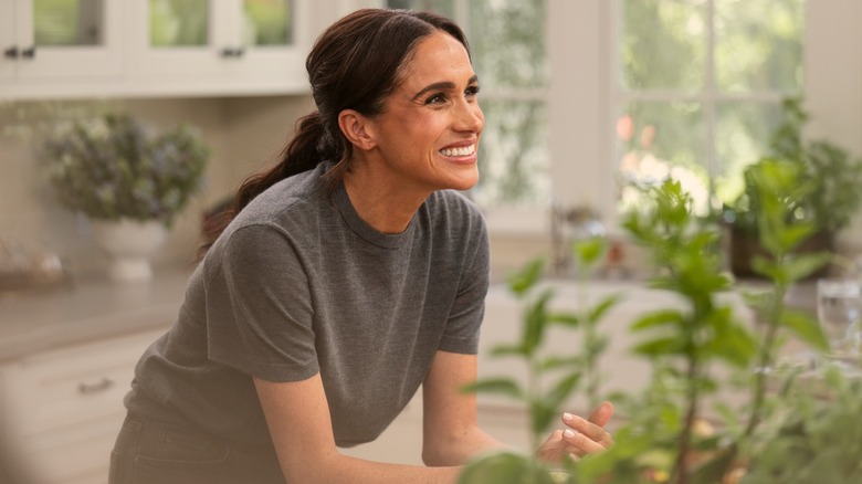 Meghan Markle smiling in a production still from her show "With Love, Meghan"