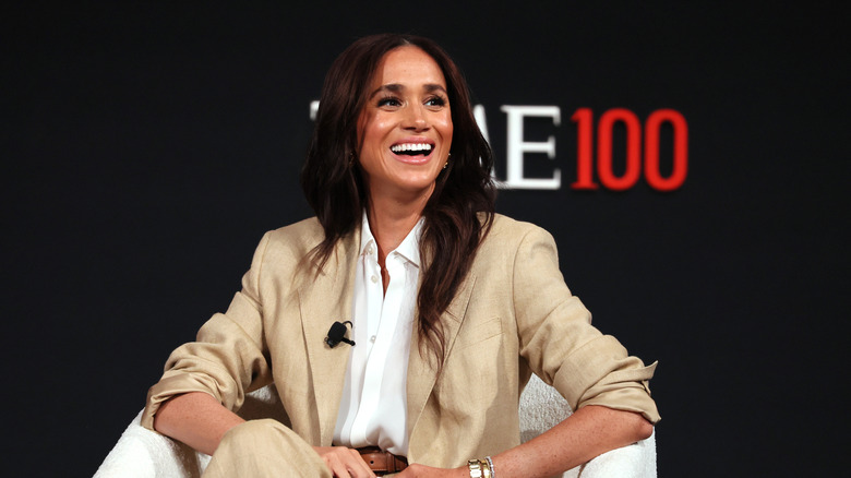 Meghan Markle on stage smiling