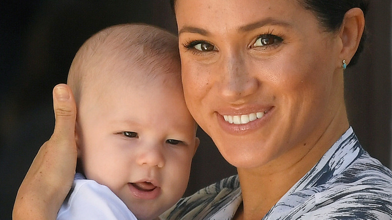 Meghan Markle cuddling baby Archie 