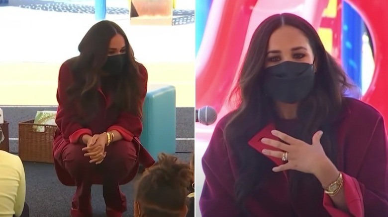 Meghan Markle talking with school kids