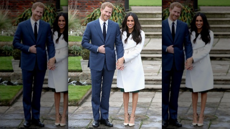Prince Harry and Meghan Markle smiling