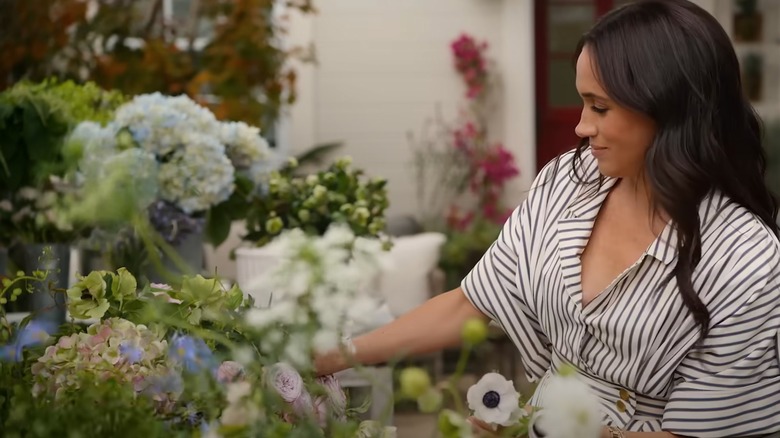 Meghan Markle picking flowers