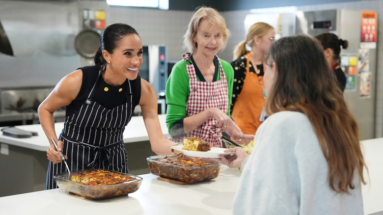 Meghan Markle serving frittata
