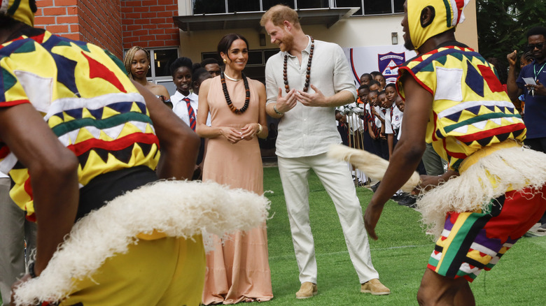 Prince Harry and Meghan Markle smiling