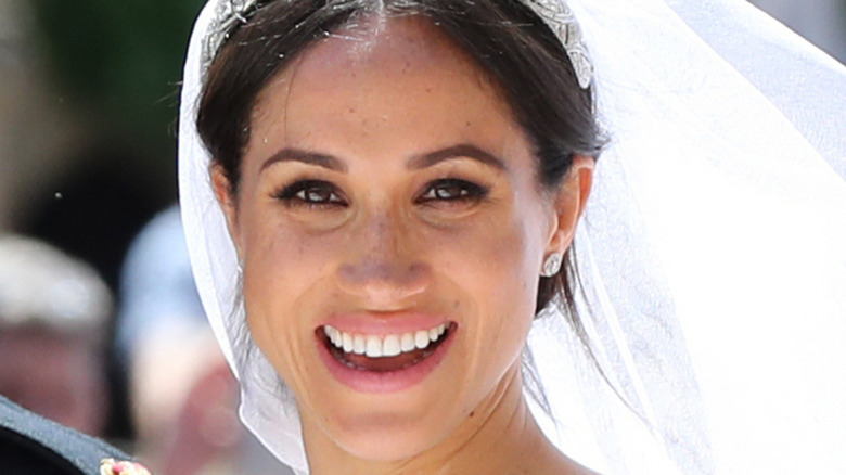 Closeup of Meghan Markle smiling on her wedding day