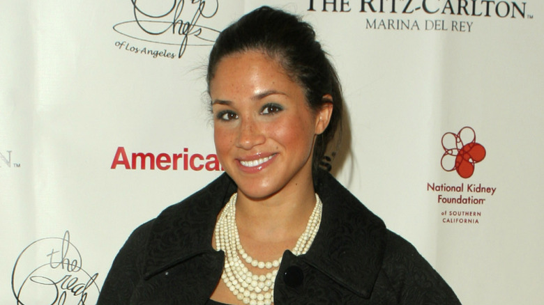 Throwback photo of Meghan Markle posing on ste-and-repeat