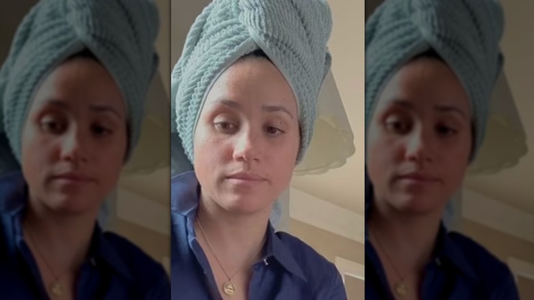 Closeup of Meghan Markle with no makeup and a towel on her head