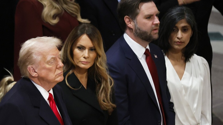 Melania Trump glaring at Donald Trump while Usha Vance stares into the distance next to JD Vance