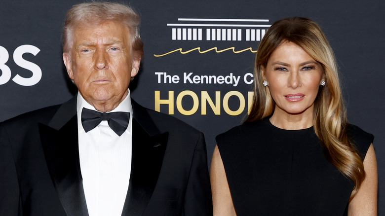 Donald and Melania Trump looking serious Kennedy Center