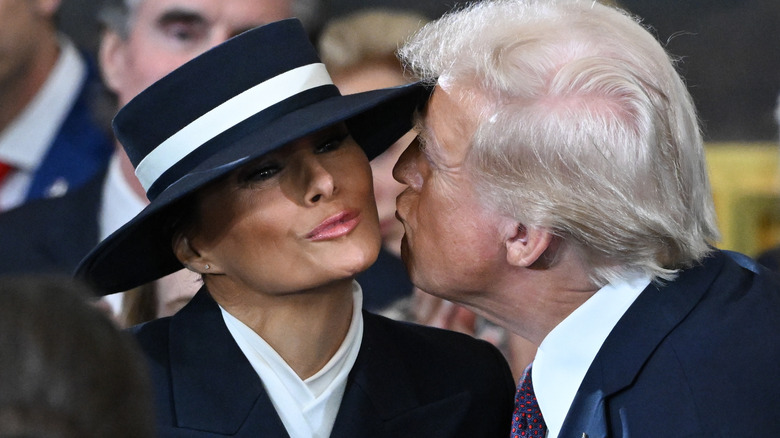 Melania and Donald Trump air-kissing